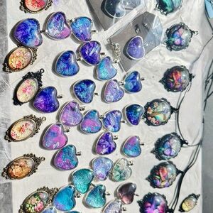 Handmade heart pendants with 20” silver color chain blues and purples. Lots 10